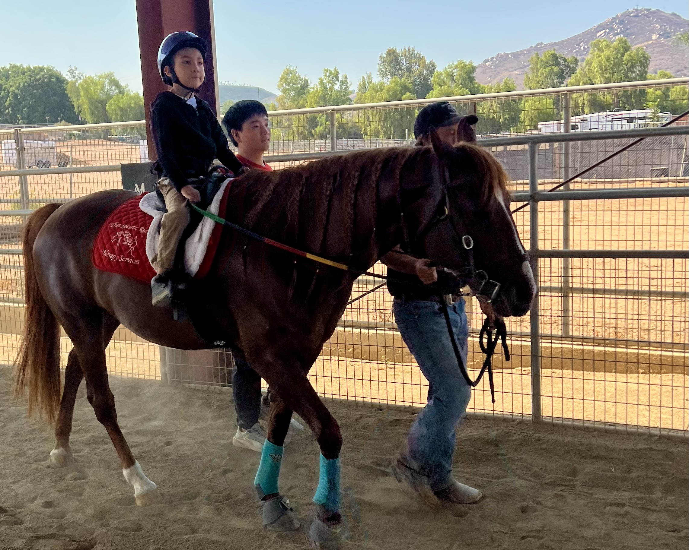 A camper riding during NDR camp